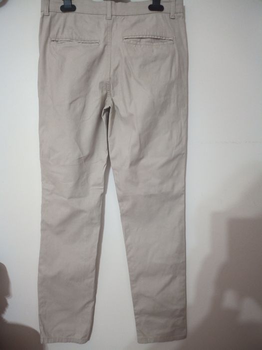 Calças rapaz bege