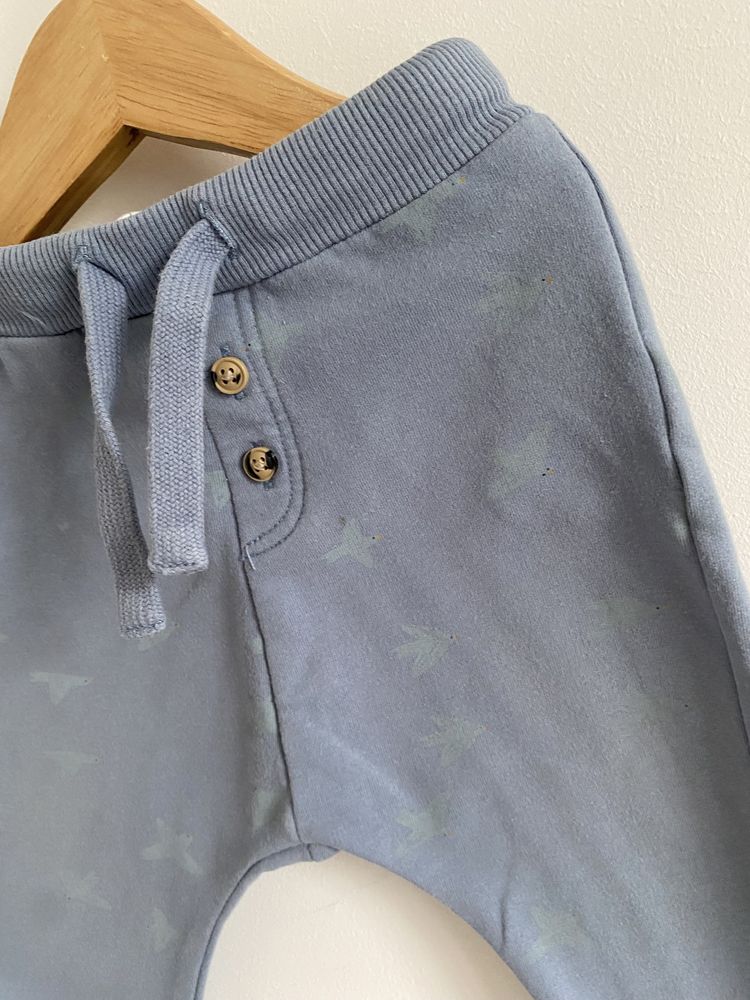 Spodnie dresowe lindex ptaszki 74 niebieskie