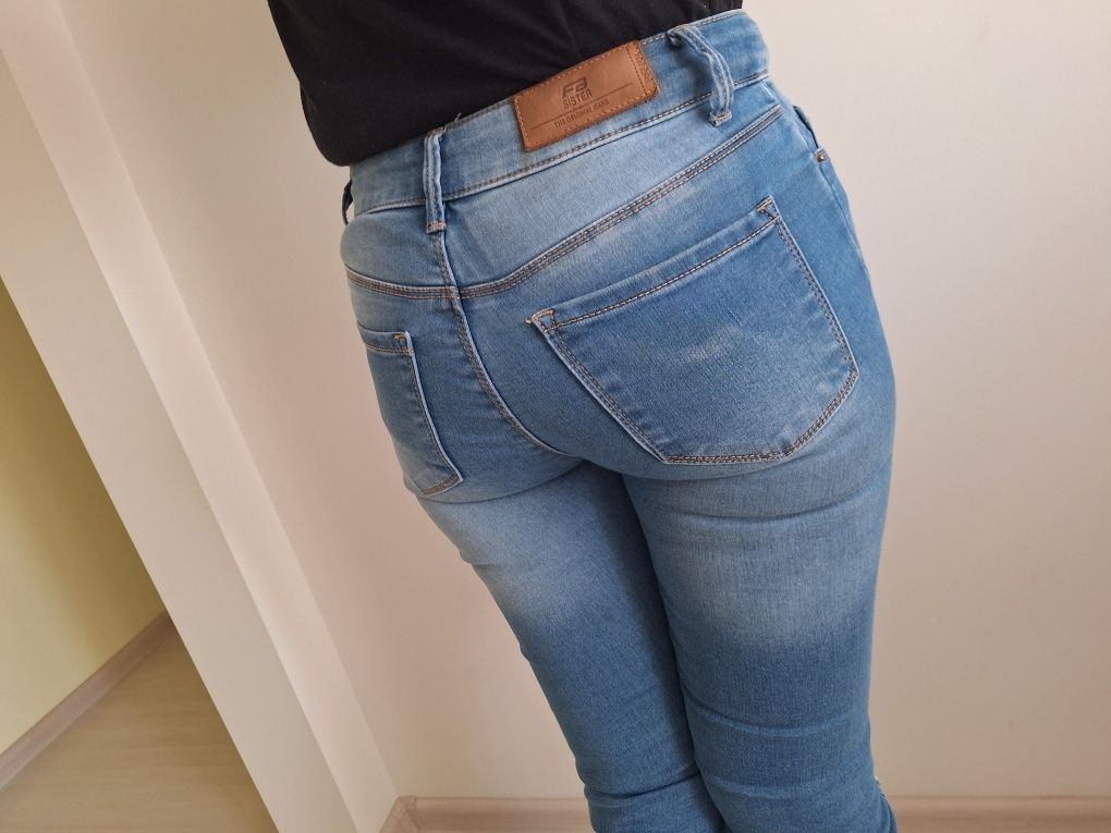 Spodnie jeansowe rurki z dziurami na kolanach xxs 32