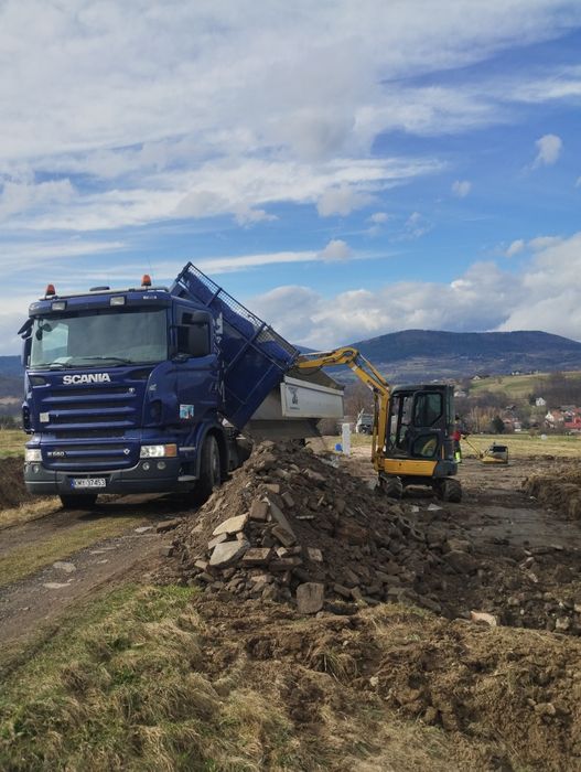 Koparka wozidlo usługi koparką wozidłem  wiertnica pod słupki