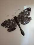 Borboleta em metal castanho