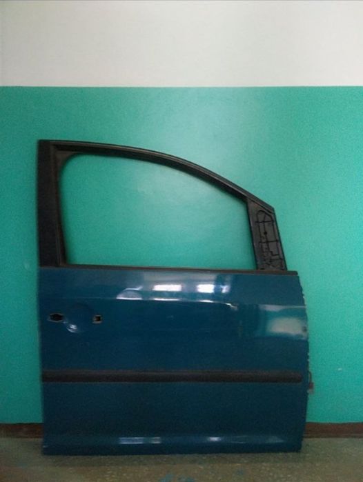 Двері VW Caddy 3(2004)