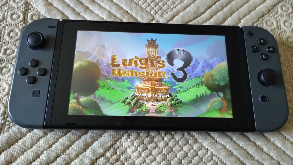 Nintendo Switch V1 + SD 200gb + Bolsa de viagem + Joystic extra