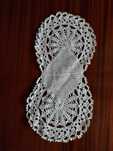 Naperon de renda vintage, em forma de infinito