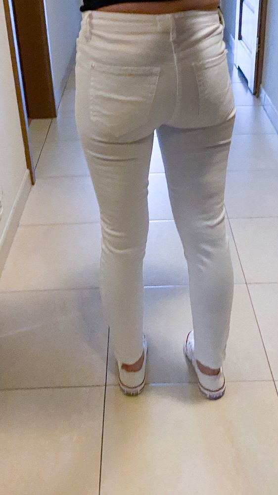 Białe jeansy Mango 34