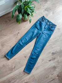 Klasyczne niebieskie rurki spodnie jeansowe Reserved XS