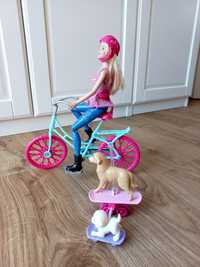 Lalka barbie Mattel na rowerze z pieskami