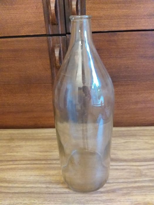 Бутель скляний на 5 літрів на вино чи сік.