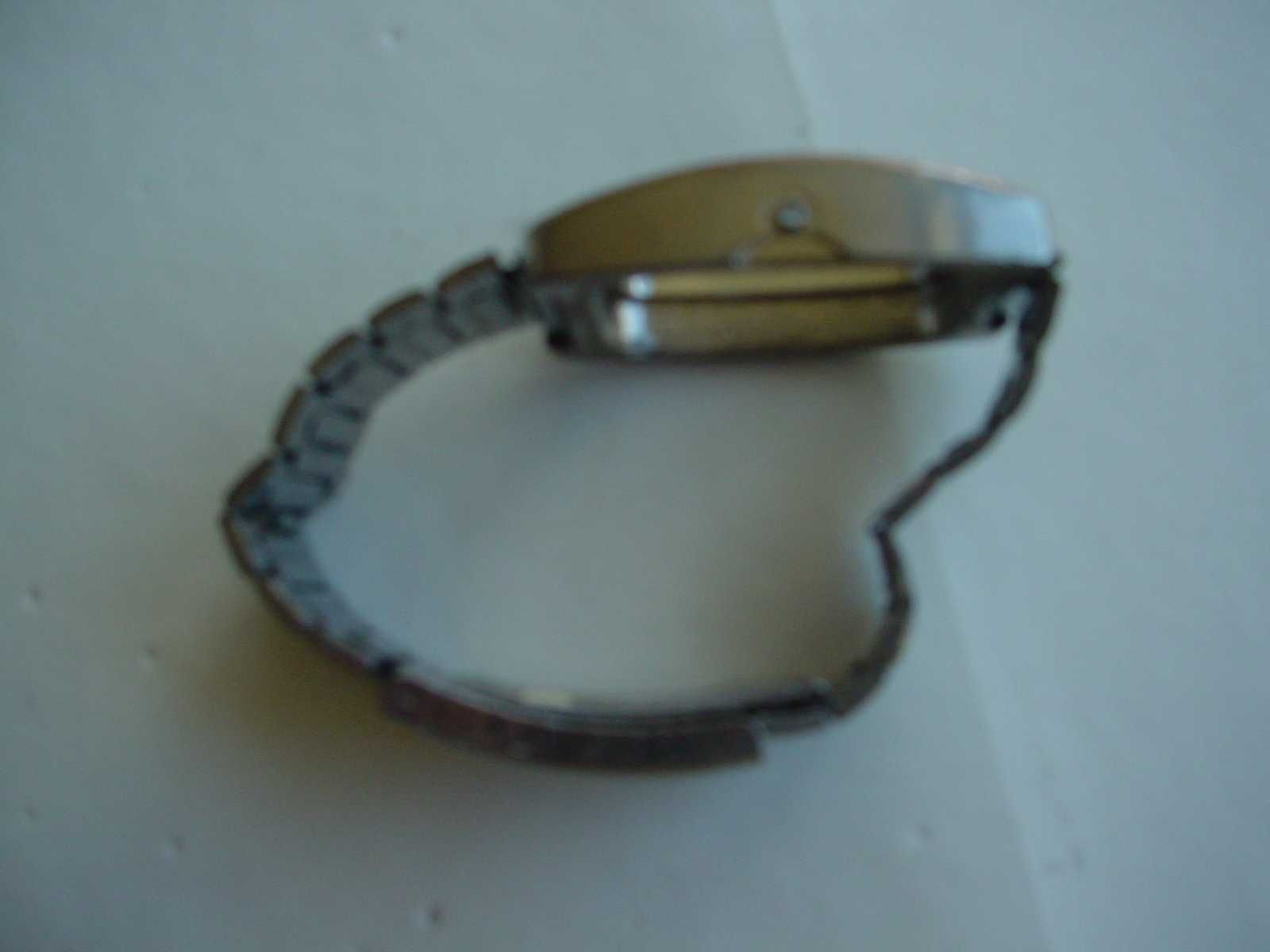 Bracelete de relógio, metálica.