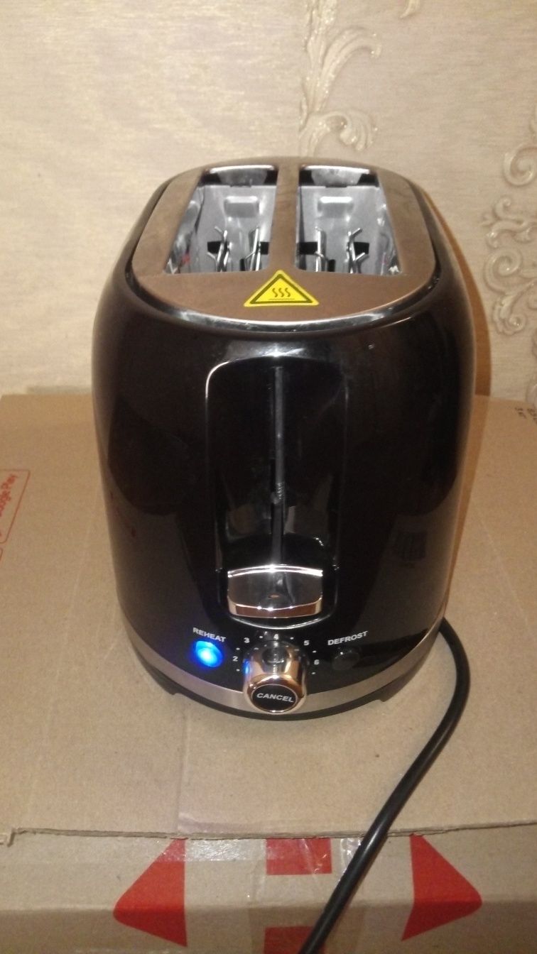 Тостер ROTEX RTM150-B