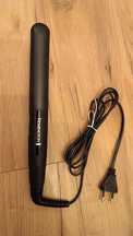 Nowa czarna prostownica Remington