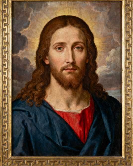 Um pendente personalizado com a imagem de Jesus gravada.