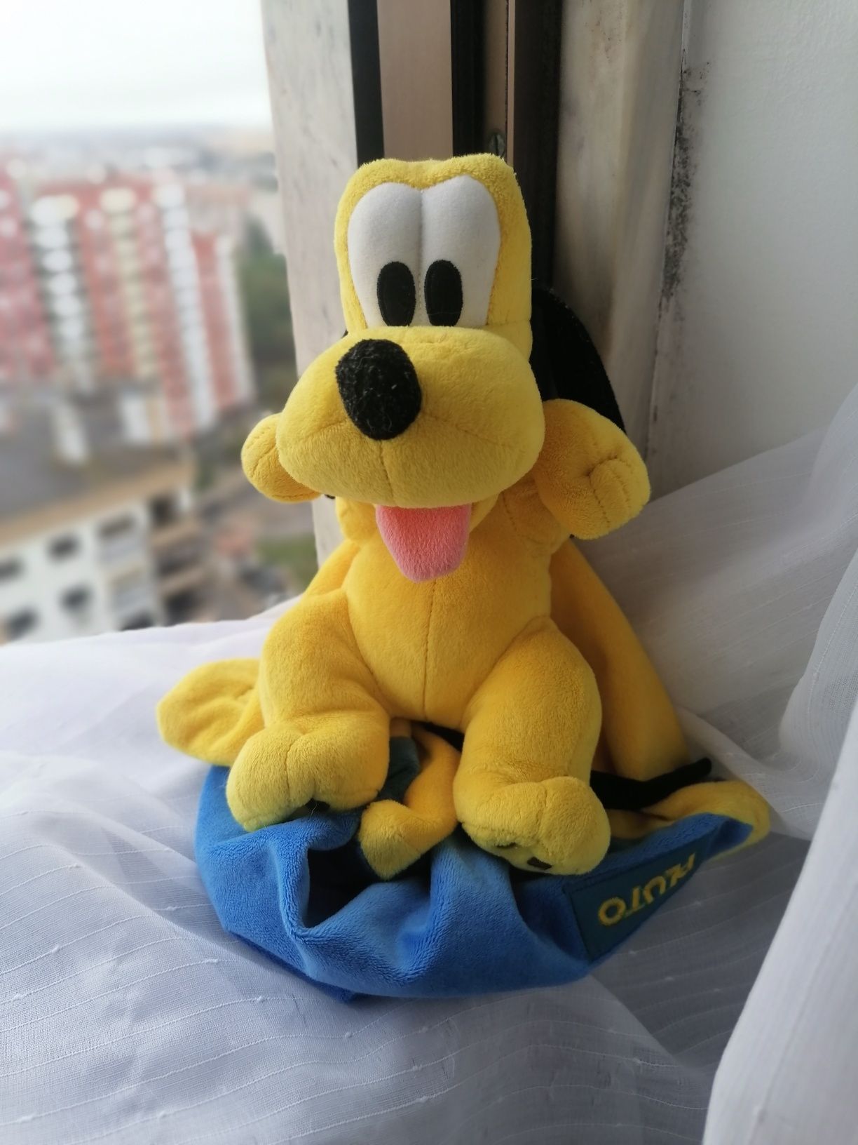 Peluche de criança pluto