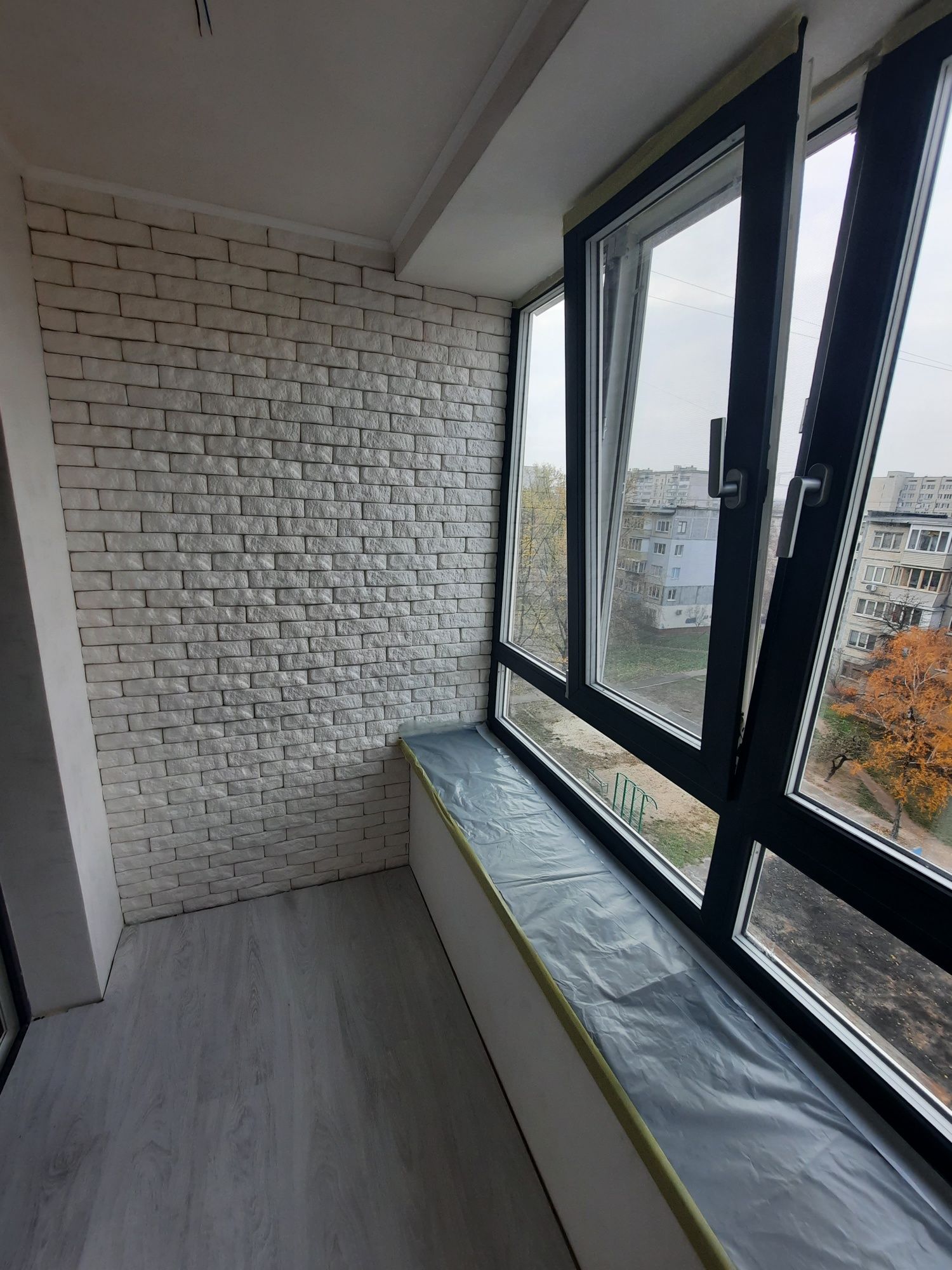 Вынос балкона Гипсокартон Декоративный камень Утепление Покраска Киев