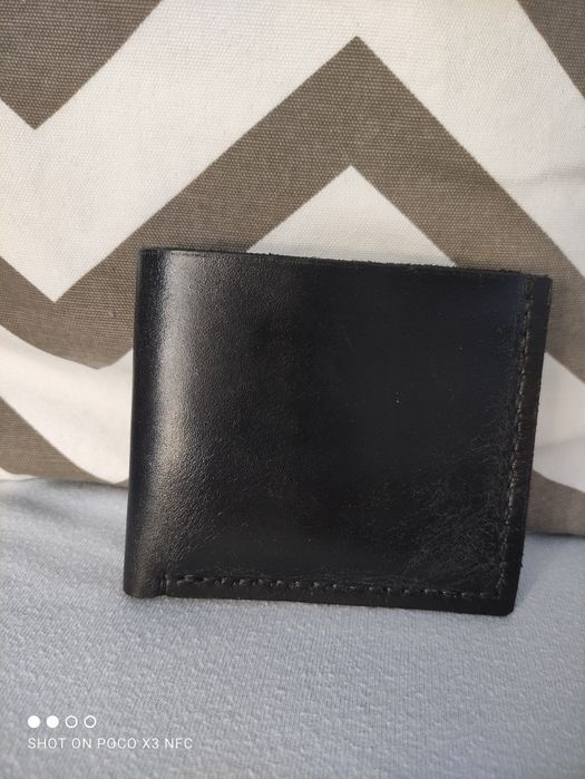 Новий шкіряний гаманець