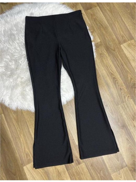 Штани фірмові кльош