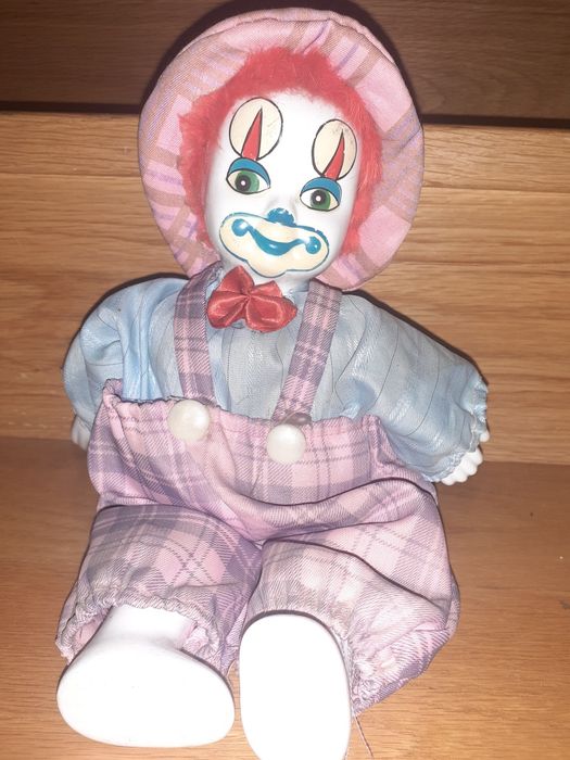 Decoração palhaço em porcelana antigo mede 30 cm