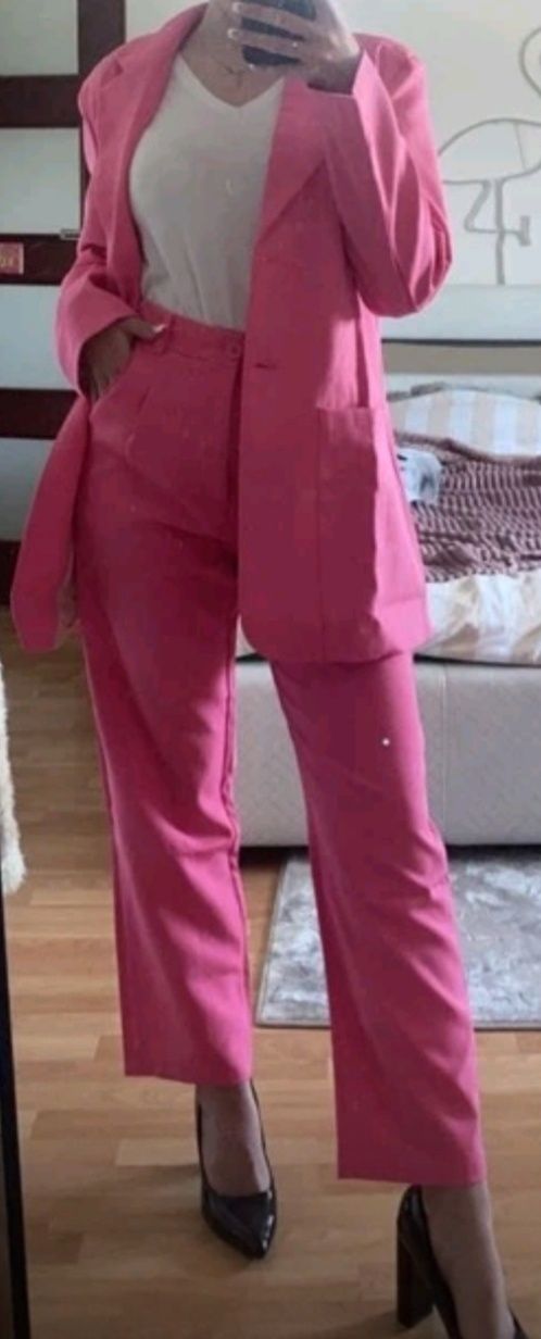 Nowe eleganckie spodnie L wyrazisty róż garniturowe