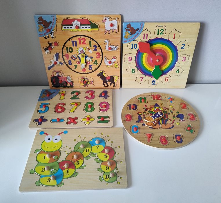 Дерев'яні іграшки пазли і вкладиші, вставки.