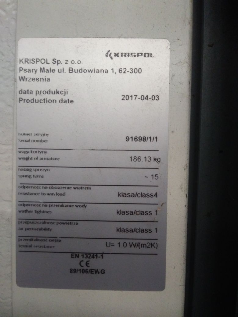 Brama garażowa segmentowa Krispol 402x450 koloru wiśniowego