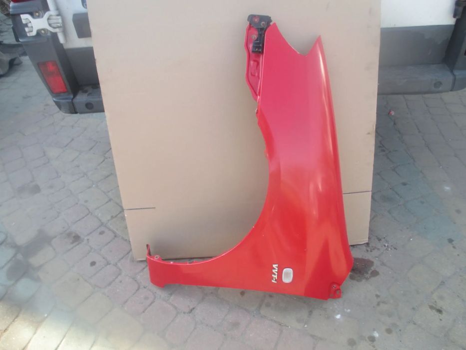 błotnik lewy Corolla E12 Sedan Orginał Kombi