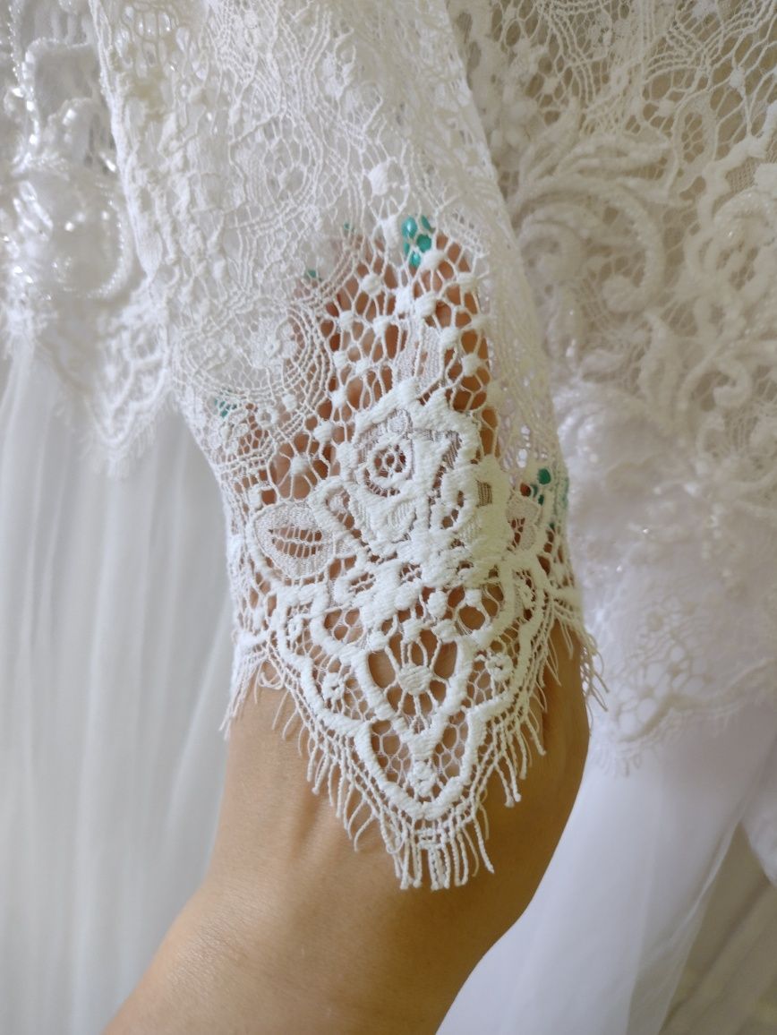 Suknia ślubna koronka długi rękaw