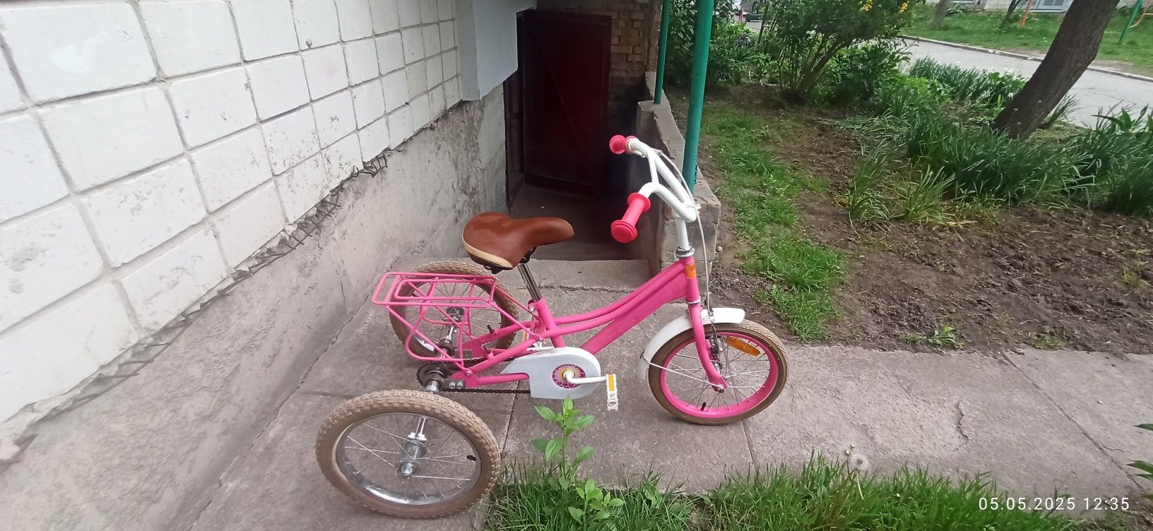 Велосипед трьех колесний