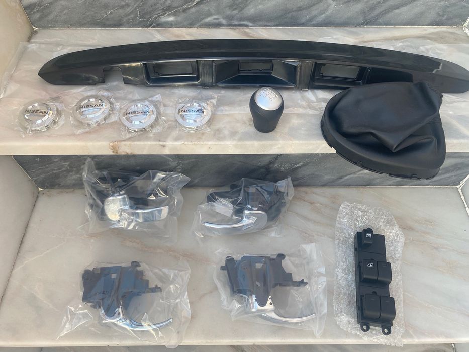 Nissan qashqai j10 puxador porta mala Manete centros comando vidro