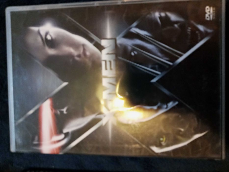 2 dvds batman o enicio e x-man