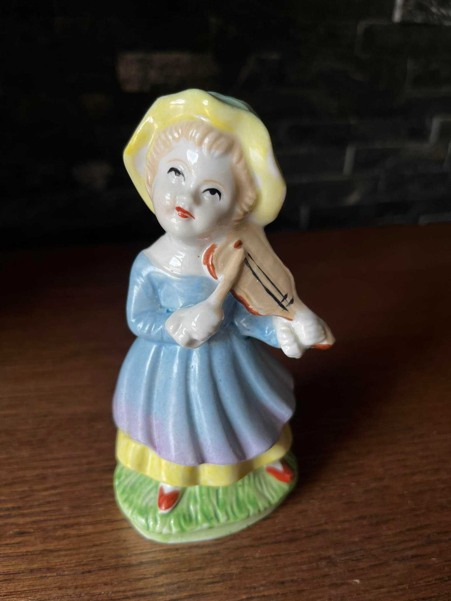 Dziewczynka ze skrzypcami porcelanowa figurka