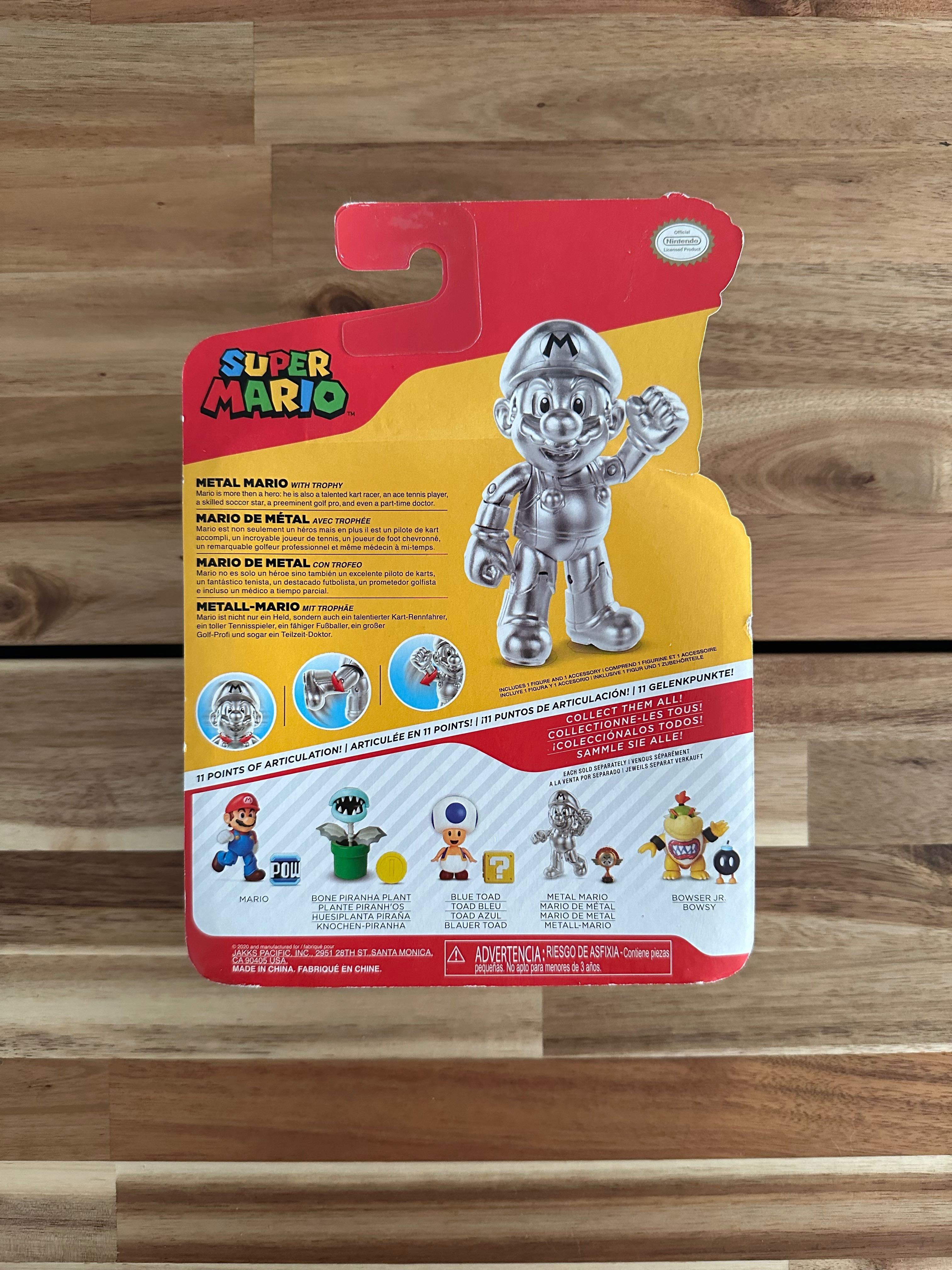 Figura Super Mario Metal Mario com troféu, como nova.