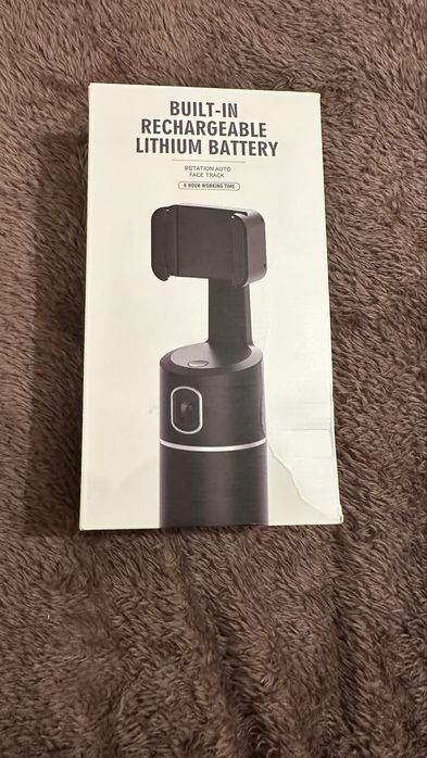 Розумний штатив з камерою і датчиком руху для смартфонів