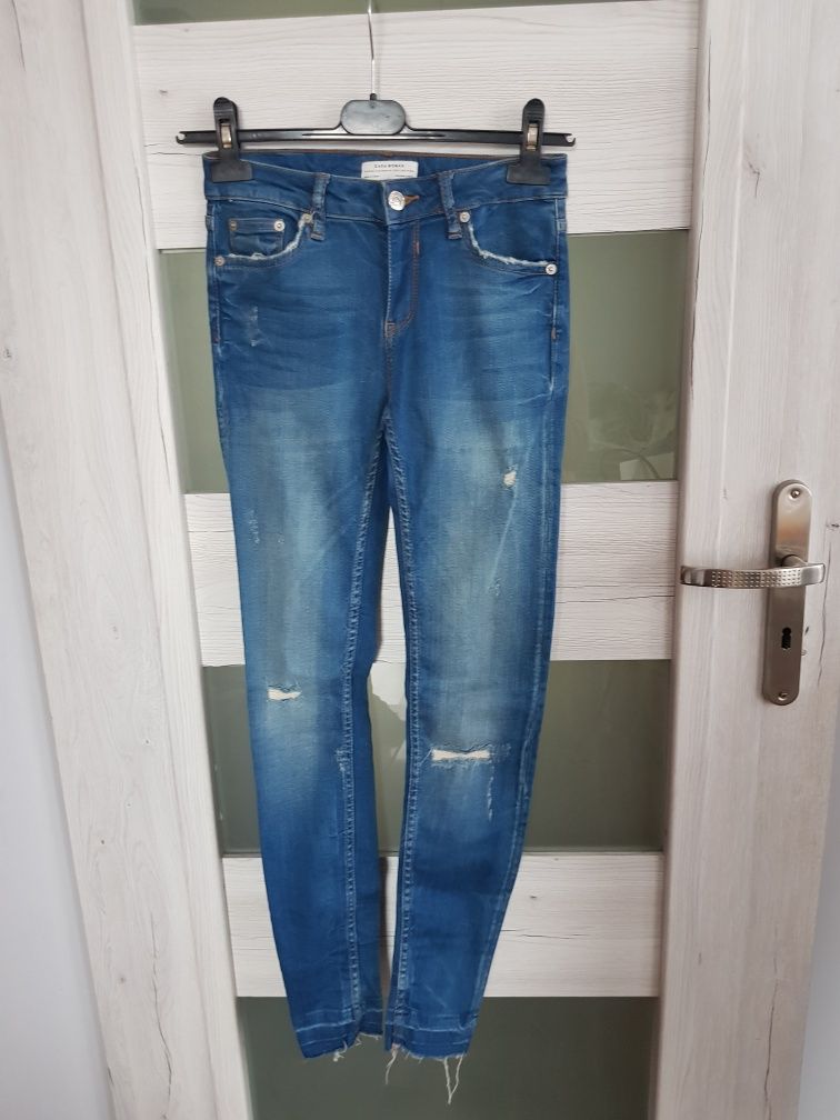 Jeansy zara r.34 xs z dziurami modny krój Premium denim mega okazja