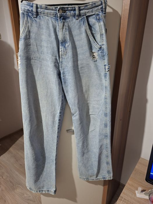 Jeansy z przetarciami Sinsay rozm.38