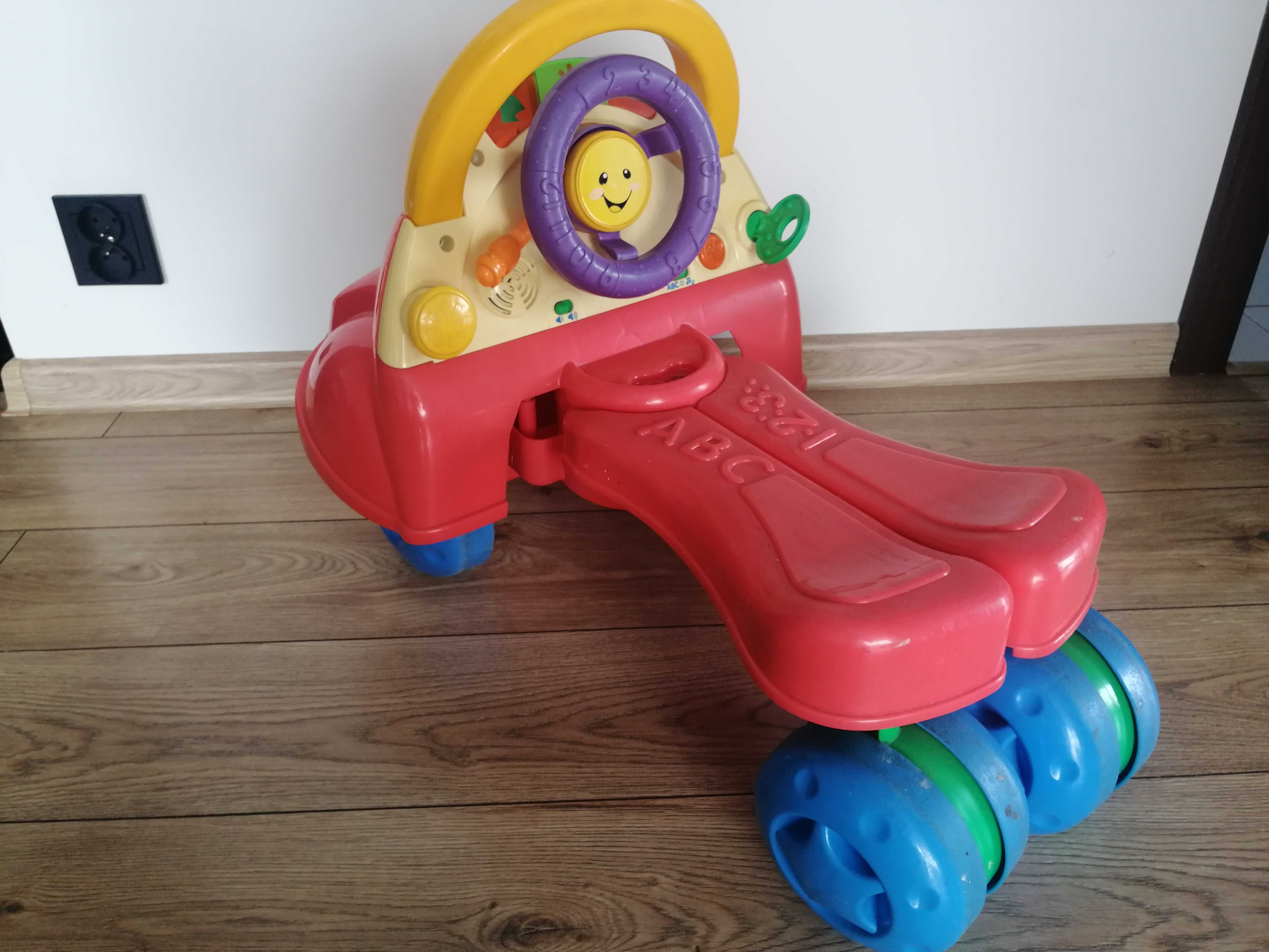 Jeździk pchacz Fisher price