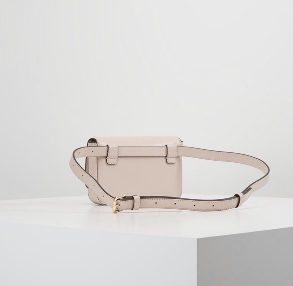 Nerka saszetka oryginalna Michael Kors pudrowy róż torebk