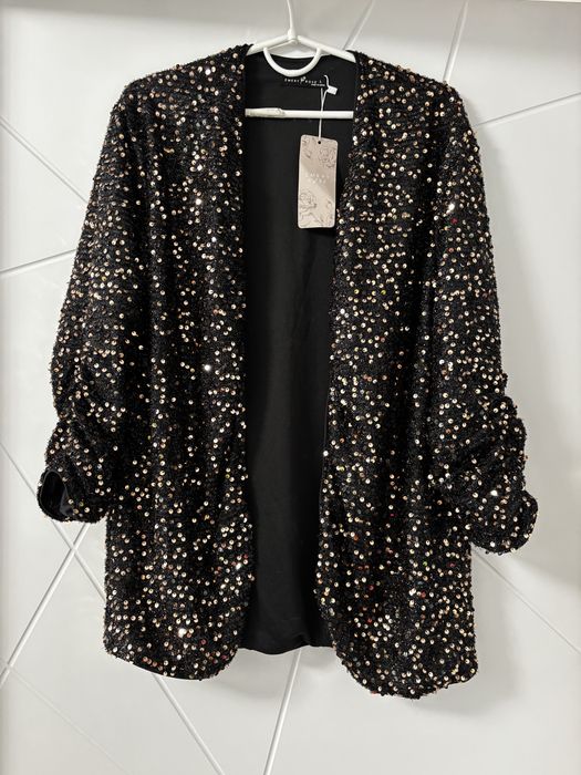 Піджак з паєтками новий