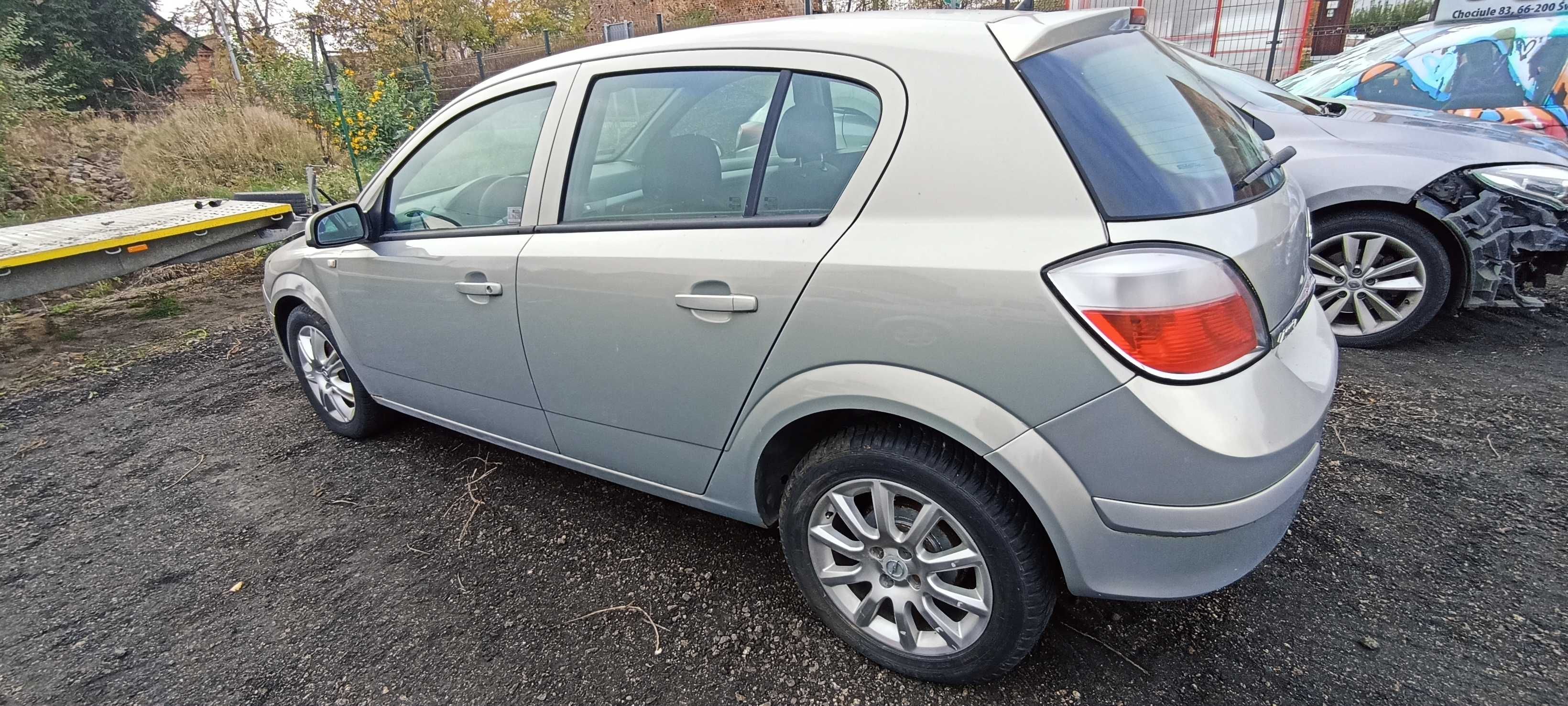 błotnik przód przedni opel astra h lak z167