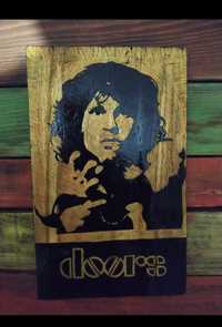 Portret Jima Morrisona wykonany z drewna.