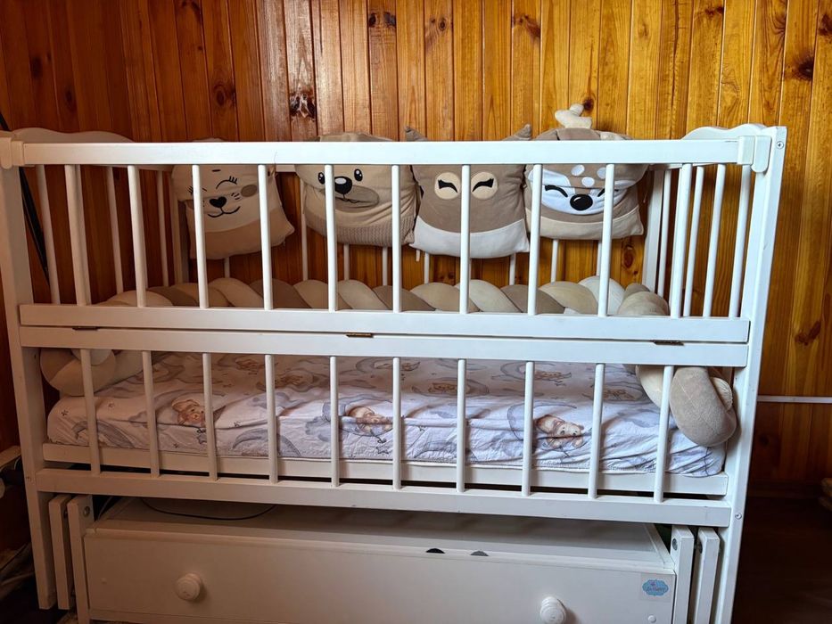 Дитяче ліжко-маятник