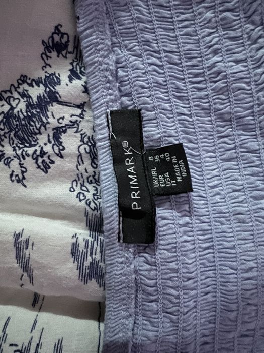 Топ блакитного кольору