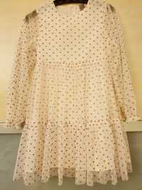 Kremowa zwiewna sukienka w gwiazdki rozmiar 134