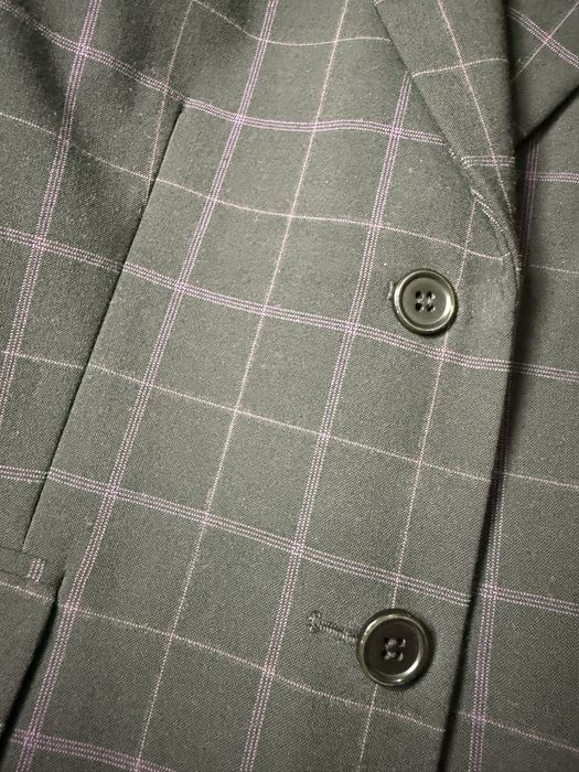 Піджак в полоску-клітинку