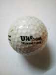 Bola de golfe usada