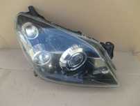 lampa prawa Astra 3 H BI-XENON Hella Europa