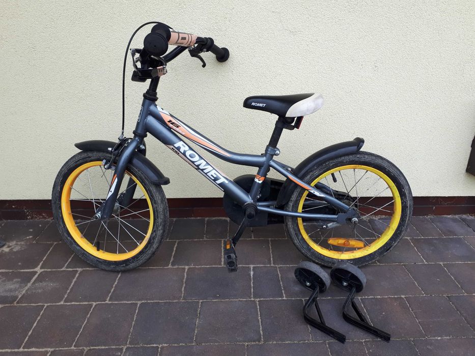 Romet Kid Tom 16 rower dziecięcy kółka boczne kask