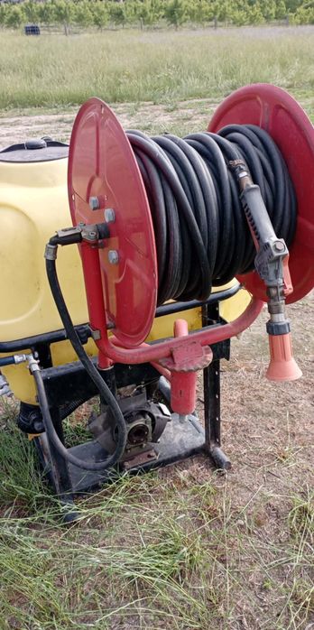 Pulverizador com enrolador