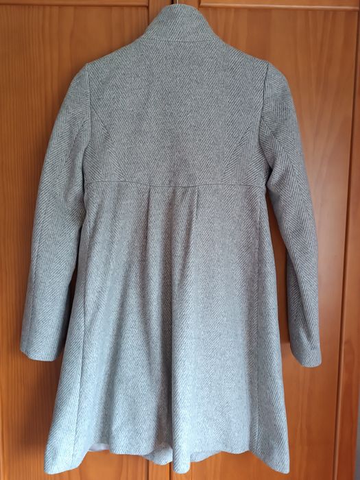 Casaco cinzento comprido