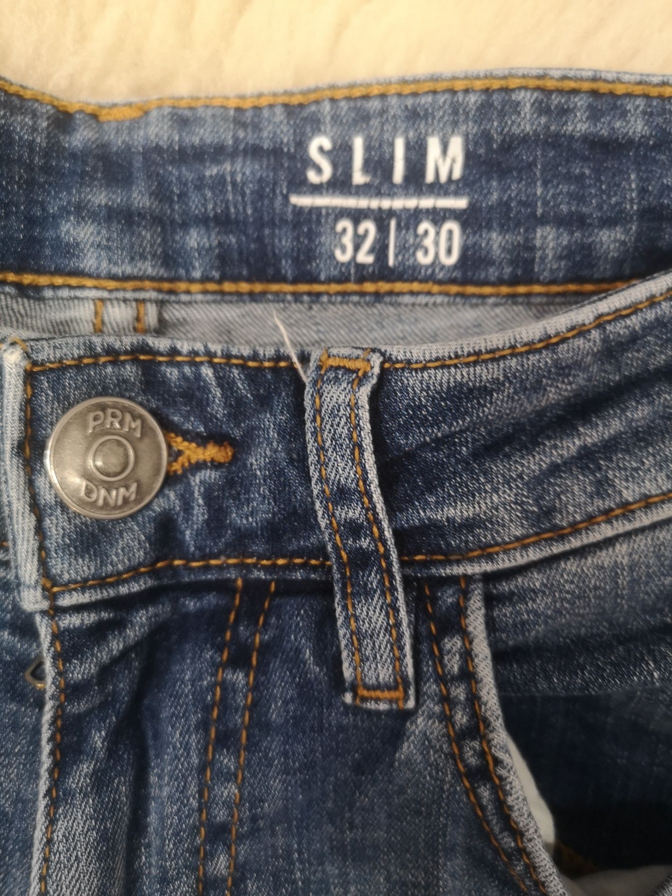 Spodnie jeansy M-L