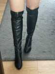 Botas acima do joelho